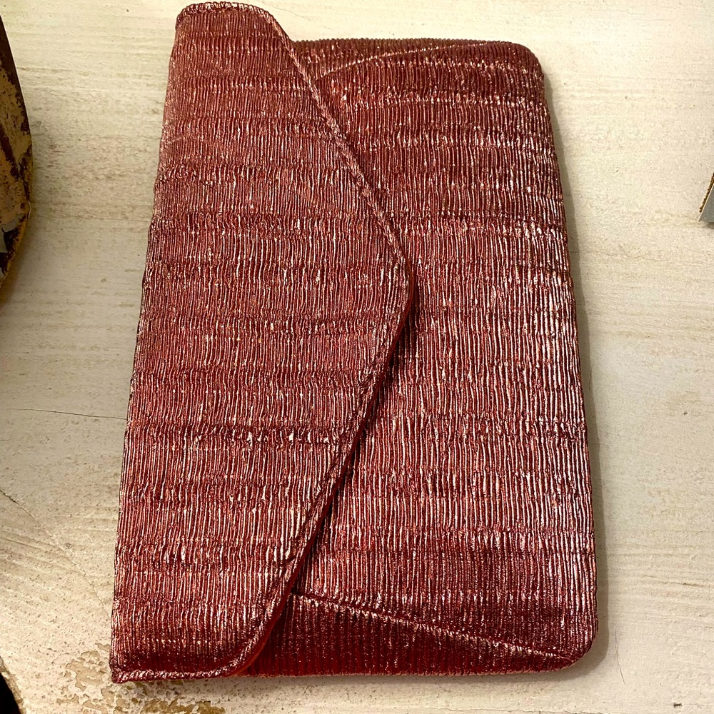 Purse - New wTag attached. Envelope style with snap closure; optional gold chain